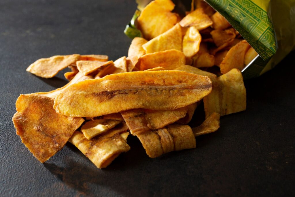banana chips artisan snack dark background gold accent